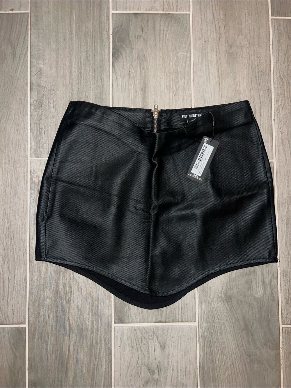 PrettyLittleThing Black Faux Leather Curved-Hem Skort
